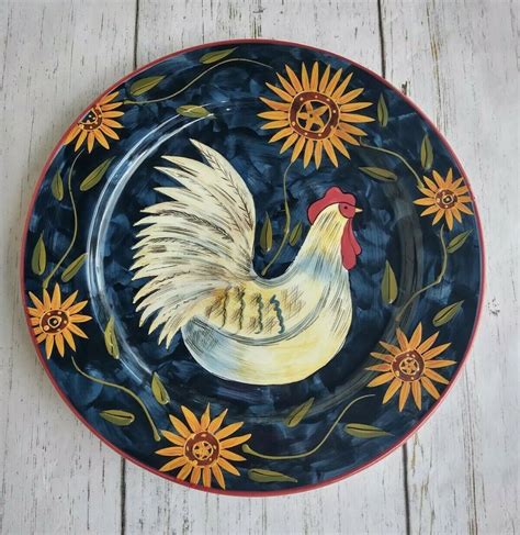 Susan winget rooster plates. Certified International Le Rooster salad plate designed by Susan Winget and featuring a central rooster image with scripted words about. Plate has a scalloped, red | russet edge. In EXCELLENT! and seemingly unused condition with NO! chips, nicks, cracks or fleabites, NO! crazing and NO! marks, stains, … 
