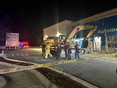 Suspect steals excavator, crashes it into Florida Walmart
