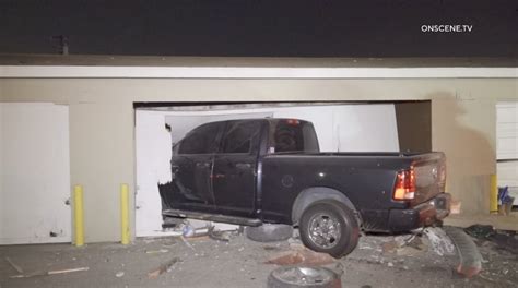 Suspected DUI driver plows into garages in Orange County