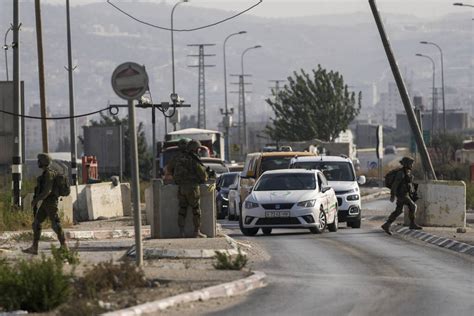 Suspected Palestinian shooting attack at West Bank car wash kills 2 Israelis