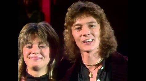 Suzi quatro and chris norman relationship. The Suzi Quatro Story – 12 Golden Hits: 1976 "Tear Me Apart" — 25 — — — — 42 — — — 27 Aggro-Phobia ... If You Knew Suzi... "The Race Is On" — 28 10 — 15 11 — 39 — — 43 "Stumblin' In" (with Chris Norman) 4 2 6 11 2 13 — 3 2 7 41 1979 "Don't Change My Luck" — 72 — — 35 — — — — — — "I've Never Been ... 