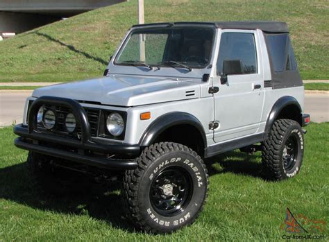 The Suzuki Samurai is known for offering real off-road ability in a compact package. And one look at this example, you can instantly see they made plenty of investments to enhance that 4x4 attitude. This includes the tall stance, upgraded lighting, and a recent major tune-up to the fuel-injected motor..