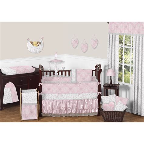 This Sweet Jojo Designs set will fit most standard cribs and is machine washable for easy care and repeated use. Sweet Jojo Designs creates various coordinating room accessories for all of their children's bedding sets including wall decor, hampers, lampshades and window treatments.. 