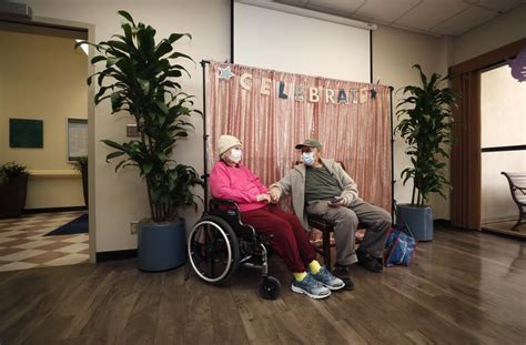 Sweethearts of 72 years hold hands, hug after a year of social