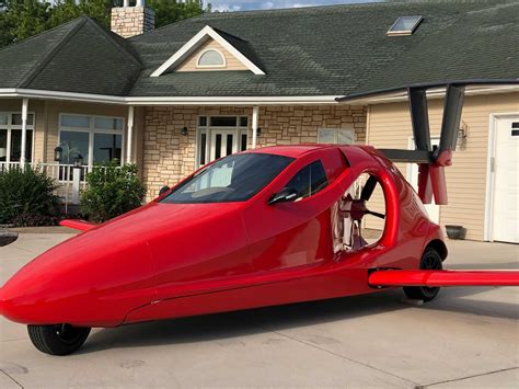 Switchblade flying car. The Switchblade flying sports car is classified as an experimental aircraft, seating two occupants side-by-side, reaching a maximum airspeed of 200 mph and driving speed of 125+ mph. It has a ... 