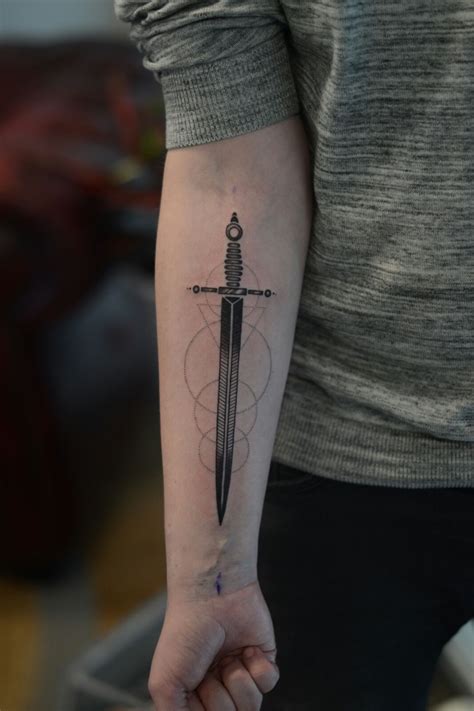 Sword Forearm Tattoos. There's a place to flaunt your ink with pride! Sword forearm tattoos offer visibility and style in one chic package. Whether it's a fine line design or a vibrant, colorful piece, your forearm is perfect for showcasing your inner warrior or philosopher. With every gesture, you share a piece of your story.