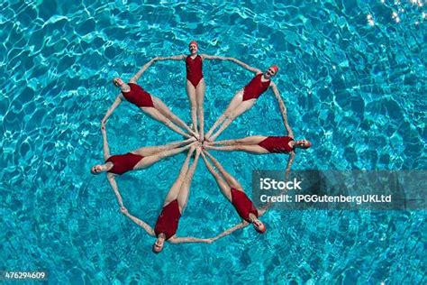 Synchronized Swimmers Forming A Circle Stock Photo Download Image Now iStock