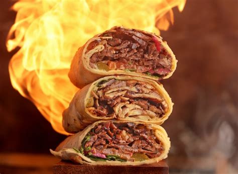 Syrian shawarma. Shawarma ( / ʃəˈwɑːrmə /; Arabic: شاورما) is a Middle Eastern dish that originated in the Levant region of the Arab world during the Ottoman Empire, [1] [2] [3] [4] consisting of … 