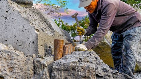 The process of carving basalt to create a stone statue ... - muktibox.com
