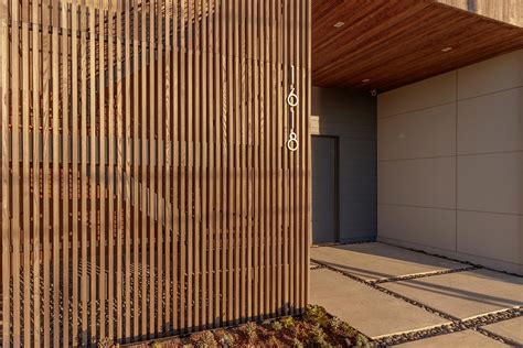 The science of stability: timber slat facades that stay in line - balustradellc