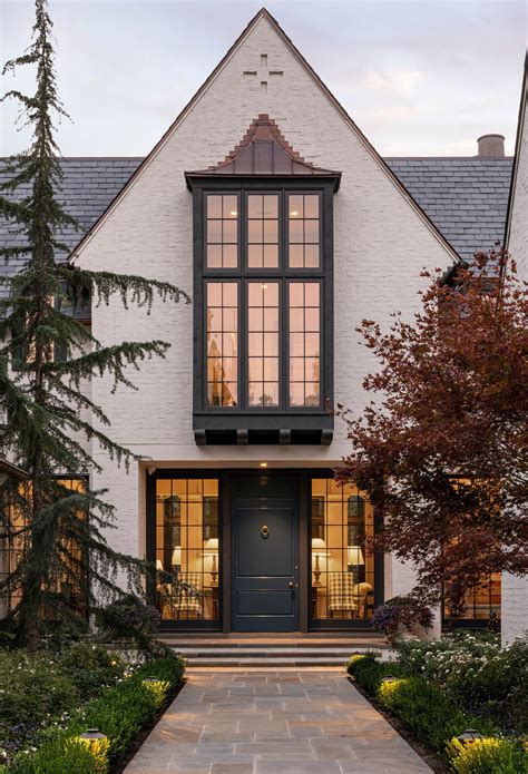 This Home Reimagines Tudor Style With a Modern Twist - balustradellc