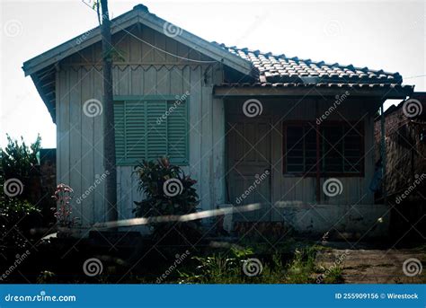 This old wooden house once looked **forgotten and worn by - balustradellc