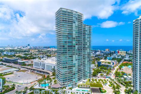 Top 12 Miami Condos that Give You Exclusive Beach Club Access - balustradellc