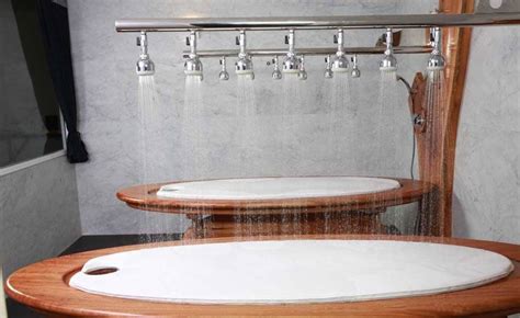 Table shower urban dictionary. To use a table shower, patrons lie down on the table before the showerheads drop water over their bodies. A technician then adjusts the showerheads to comfortably reach certain parts of your body. There is a drain on the bed to keep it from overflowing. On its own, table showers are a popular form of hydrotherapy. 