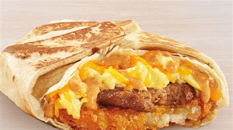 Taco bell breakfast taco. Sep 24, 2018 · The Sausage Flatbread Melt is one of the more straightforward items on Taco Bell's breakfast menu. The flatbread is thicker and fluffier than the tortilla (similar to pita bread), and gets some nice color on the grill. Wrapped around the big salty sausage patty with some melted cheese, it's satisfying in a simple way. 