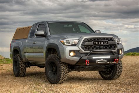 Tacoma 3rd gen. Jul 19, 2021 ... Toyota Tacoma 4WP Factory Modular Front Bumper · Integrated low-profile bull bar · Winch capable up to a 12,000-pound winch · Two 2×2 square&n... 