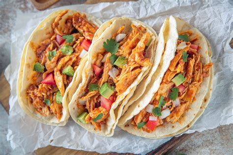 Tacos de pollo. Instructions. Begin by heating up corn tortillas. I used a cast iron skillet for this but there are many other methods that will also work. Heat up shredded chicken using either stove top or microwave. Add 1oz of … 