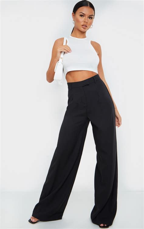 Tailored wide leg pants. Wide-leg pants are the statement-making wardrobe hero you’ll feel so extra in. From palazzo pants to sporty cargo styles, there's room for everyone’s taste—and then s ome. Pair tailored, belted styles with crop tops to balance out the volume, or style sleek satin flares with a flowing blouse for that vintage 70s disco groove. 