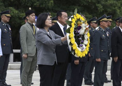 Taiwan’s president renews her pledge to stronger self defense during visit to war memorial