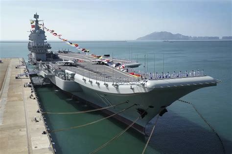 Taiwan says Chinese warships pass through Taiwan Strait as Beijing keeps up pressure on island