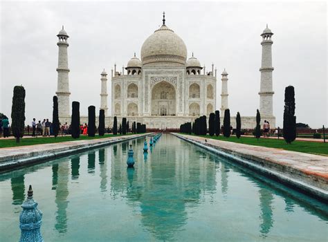 India’s most iconic building, a monument to love, and mausoleum to a favourite wife, the Taj Mahal is built entirely from white marble, its exquisite symmetry mirrored only by the reflecting pool that runs down the centre of its gardens. It was built by Shah Jahan for his third wife Mumtaz Mahal who used a purported 20,000 stone carvers .... 