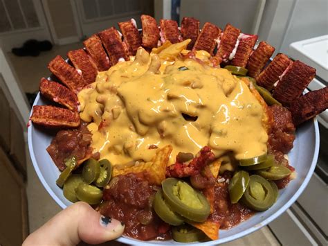 Taki nachos. Takis recently released Takis Intense Nacho, their very first non-spicy flavor. Are Takis still good if they don't mildly upset you? Is the nacho cheese flavor as intense … 
