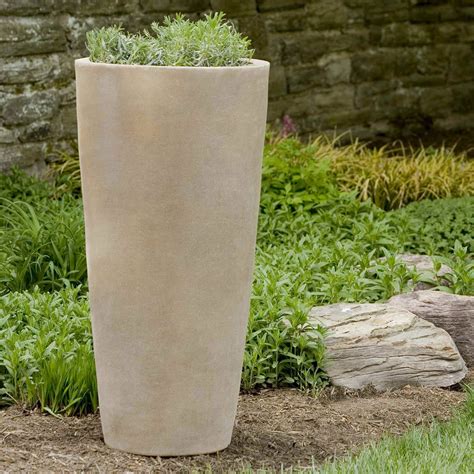 11.42" Indoor/Outdoor Earthenware Ceramic Planter Cream - Opalhouse™ designed with Jungalow™. Opalhouse designed with Jungalow. 27. $25.50 reg $30.00. Clearance. When purchased online. Create a green indoor or outdoor spot with planters and your favorite plants. At Target, find the right size planter for your greenery. . Tall outdoor planters lowes