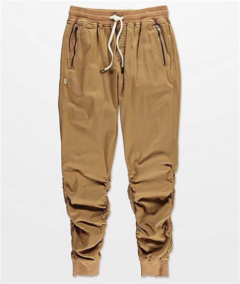 Tan joggers. Sweatpants offer a comfortable fit with a straight leg design, and joggers use the signature tapered design for an on-trend look and feel. American Eagle women’s joggers and sweatpants use the softest, best fabrics in the game to create a feeling you’re going to want to live in. Fleece always feels good when it’s time to relax, and ... 