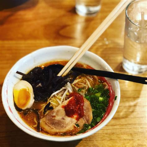 Tanaka ramen. The most authentic Japanese ramen. Vegetarian Dan Dan Man. Vegan broth: green onion, spicy bean sprouts, spinach, cauliflower, broccoli, kikurage, cabbage, with black pepper, served with thick noodle 