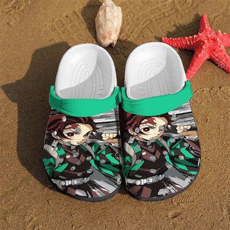 Tanjiro crocs. These Kamado Tanjiro Anime Crocs Clog Shoes are a must-have for any die-hard Demon Slayer fan. The detailed design features the iconic character Kamado Tanjiro, complete with his signature green and black uniform. Whether you’re rewatching your favorite episodes or attending a cosplay event, these slippers are sure to make a statement. 