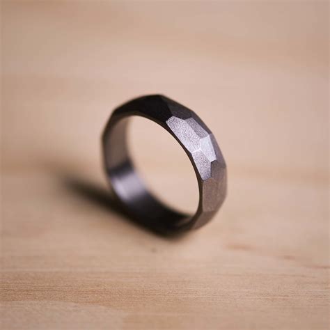 Tantalum ring. Tantalum Rings. A tantalum ring is a bold, edgy choice that is perfect for anyone looking to elevate their look with a modern twist. Previously known as tantalium, tantalum is a rare, blue-gray, and lustrous transition metal that is highly corrosion-resistant, making it an excellent material to craft wedding rings meant to be worn every day. 