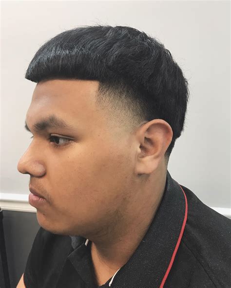 Minimal Taper Fade. Another softened up way of presenting your haircut in this manner is by endorsing a minimal taper on the sides. It only opens up the sideburns and lets you grow your nape to the full extent. The Edgar taper works just because of the frontal bangs that are kept sharp and concealing the forehead halfway through toward the ...