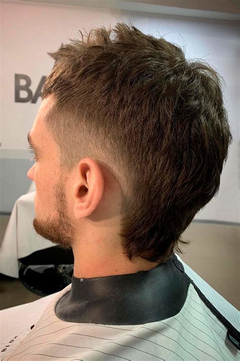 11. Taper Drop Fade Mullet. The drop fade is a stylish haircut that features a gradual tapering of hair from the top to the back and sides of the head. It starts high up on the sides and drops behind the ear, blending the hair into the skin for a clean and sharp look.. 