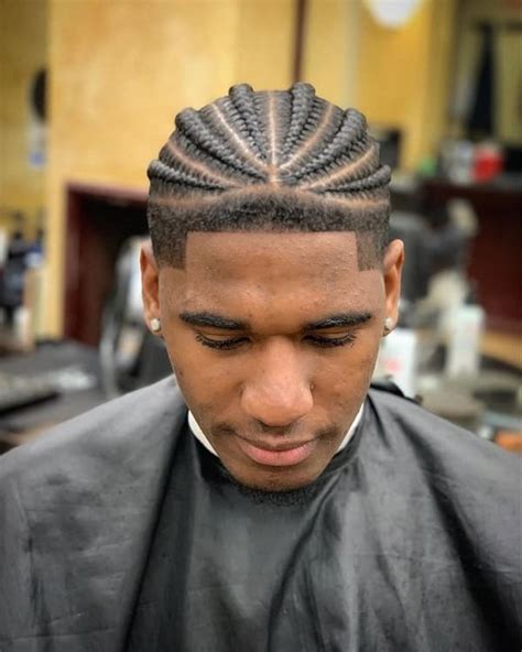 Source: Instagram@ joejoe.barbershop. Caesar Taper Fade is a fusion of modern and classic haircuts that any black man can pull off. It is one of the most fresh-looking and fashionable looks. You have to keep the hair longer on the top of the head and comb towards the hairline. Try not to part your sides.. 