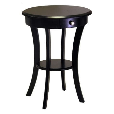 Shop Wood and Metal Round End Table Black - Room Essentials™ at Target. Choose from Same Day Delivery, Drive Up or Order Pickup. ... Wood & Metal Accent Side Table - Black - Hearth & Hand™ with Magnolia. 5 stars. 86 % 4 stars. 9 % 3 stars. 3 % 2 stars. 1 % 1 star. 2 % 4.8. 4.8 out of 5 stars. 1899 star ratings.. 