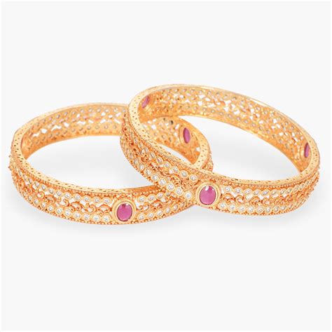 8. Oma Antique Bangles: Another set of gorgeous bangles that has won quite a few hearts is the Oma antique bangles. The unusual patterning of diamond-shaped colored CZs, a geometric design process, and effortless artisanship shines …. 