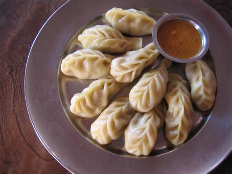 Tasty momo. Specialties: Mo:Mo: is a food from Nepal and Tibet. It is also known as Dumplings. They are made out of minced meat or vegetables in dough. They can be served steamed, deep fried or pan fried with spicy tomato sauce. Established in 2015. Tasty Mo:Mo: is looking forward to a small start up business, out to serve authentic Nepalese cuisine. Tasty Mo:Mo: will be serving frozen momos, steam momos ... 