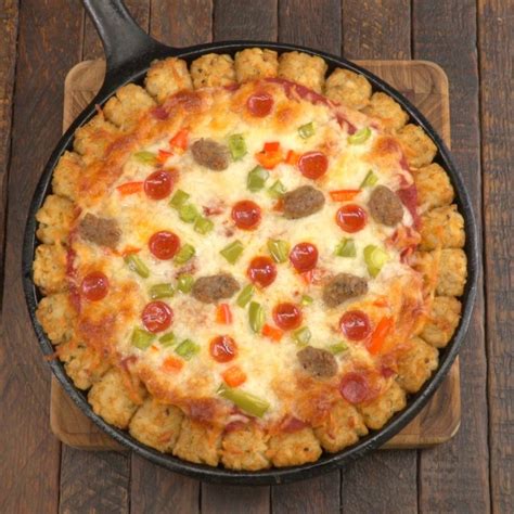 Tater tot pizza. Dec 9, 2018 · Instructions. Bake tater tots according to package instructions. Remove tots from oven and add two tots to a toothpick. Continue until all tater tots are on toothpicks. Top with barbeque seasoning. Top with Colby jack cheese and chopped bacon. Add to oven and bake for 10 minutes or until cheese is melted. 