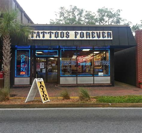 Destin Tattoo Company provide anything from black and gray tattoo color old school traditional tribal tattoo realistic portraits polynesian cover up. top of page. Destin Tattoo Company Tattoos & Pircings. Tattoo and Piercing Studio. Walk-ins welcome . Open 12 pm to 10 pm . 7 days a week .