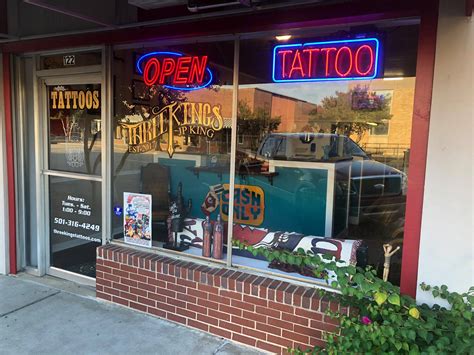 Reviews on Tattoo Shops in AR-7, Russellville, AR - Big Country Tattoos, Primal Urge Tattoos and Piercings, Psycho Ink, VIVID Hair & Body Art Studio, Alter Ego Body Piercing, Anchor Tattoo & Body Piercing, Mike's Piercing Parlor, New Traditions Tattoos, Tattoos, Psychodelic Butterfly Tattoo & Piercing.