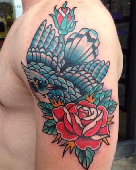 Tattoos by lou. Award-winning artists design custom tattoos to go with body piercings 