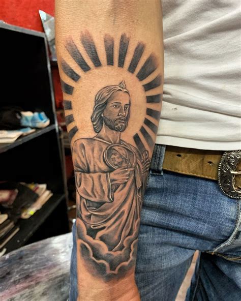 Express your devotion with a vibrant San Judas Tadeo tattoo. Explore stunning designs in various colors to showcase your faith and stand out from the crowd.