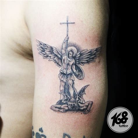 Tattoos of st michael the archangel. Michael the Marine’s devotion to St. Michael the Archangel began with a simple childhood prayer and grew into a lifelong devotion. You can instill this devotion in your child, godchild, niece, or nephew with a ceramic tile with the well-known St. Michael prayer and an image of the saint. An uplifting piece of decor for a kid’s room or a ... 