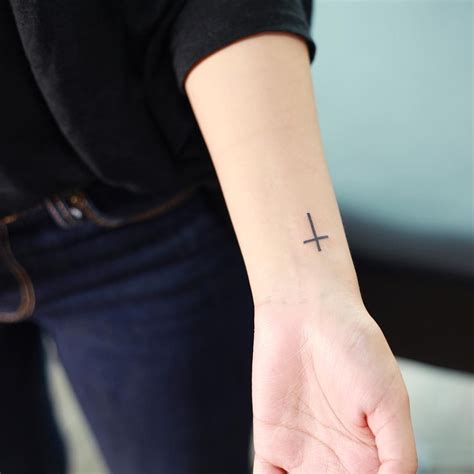 Tattoos small cross. Things To Know About Tattoos small cross. 