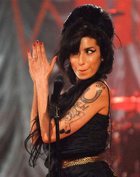 Tatuaggi Amy Winehouse - Modificazione Corporea