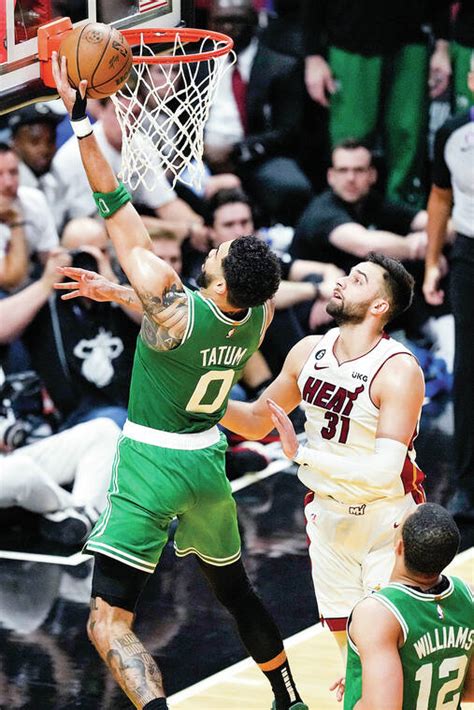 Tatum scores 33, Celtics stave off elimination by topping Heat 116-99 in Game 4
