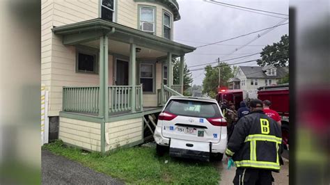 Taxi crashes into house in Roslindale