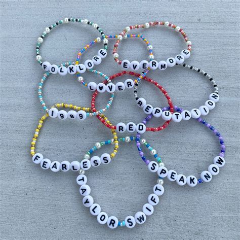 Taylor swift album colors bracelet. May 15, 2023 · Swift’s song titles, lyrics, and of course, her lucky number 13, are the most popular decorations, with fans also using the color of each era to make special album-themed bracelets. Some fans ... 