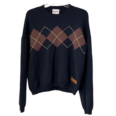 Taylor swift argyle sweater. Shop justjanecloset's closet or find the perfect look from millions of stylists. Fast shipping and buyer protection. Taylor Swift RED (Taylor's Version) navy blue and tan argyle knit sweater with "Taylor Swift" patch on bottom. Great condition with light peeling throughout. Slight tear at the bottom of the sweater, it arrived this … 