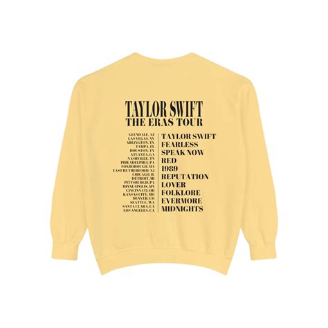 Taylor swift crew neck. June 7, 2023. Rachel Chapman/Taylor Swift/Elite Daily. As a welcome to New York leading up to her concerts at the MetLife Stadium, the Museum of Arts and Design unveiled a Taylor Swift exhibit on ... 